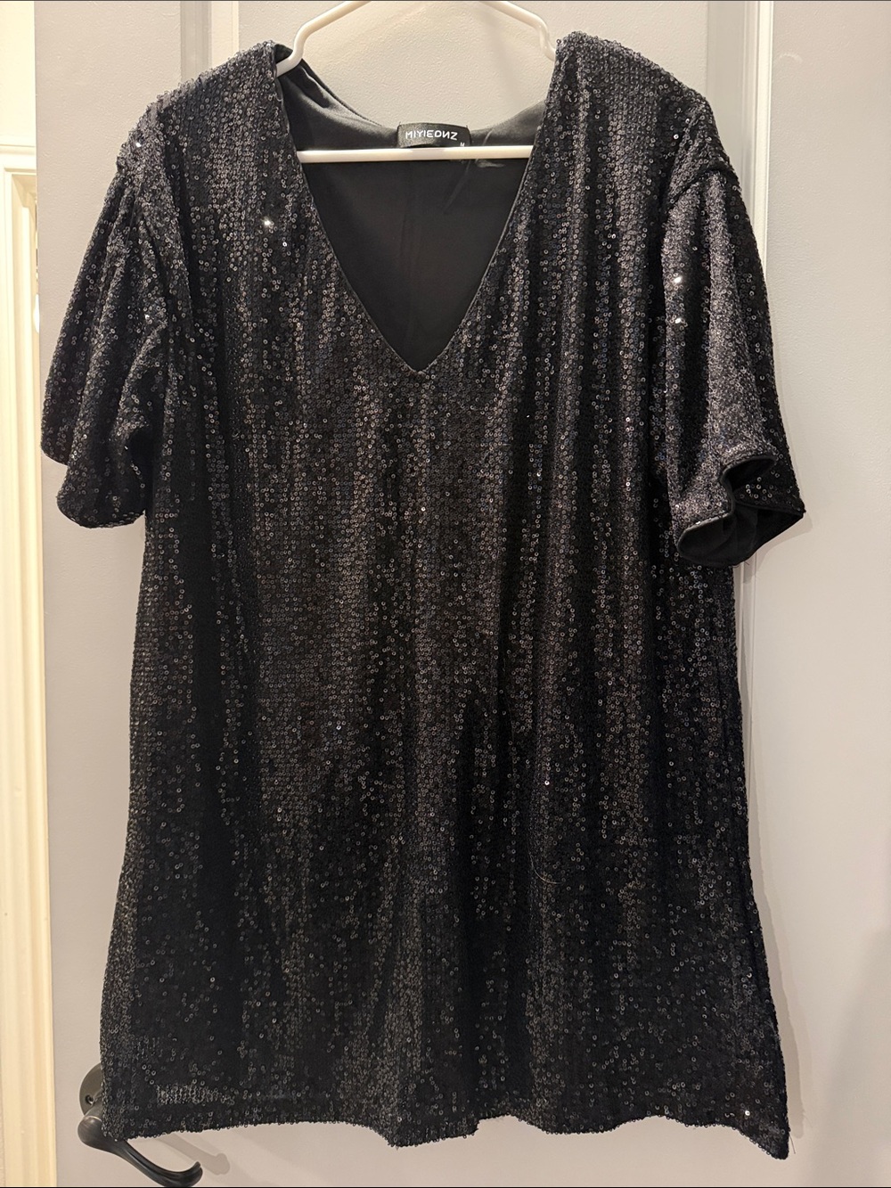 Sequin V-Neck Mini Dress in Black by